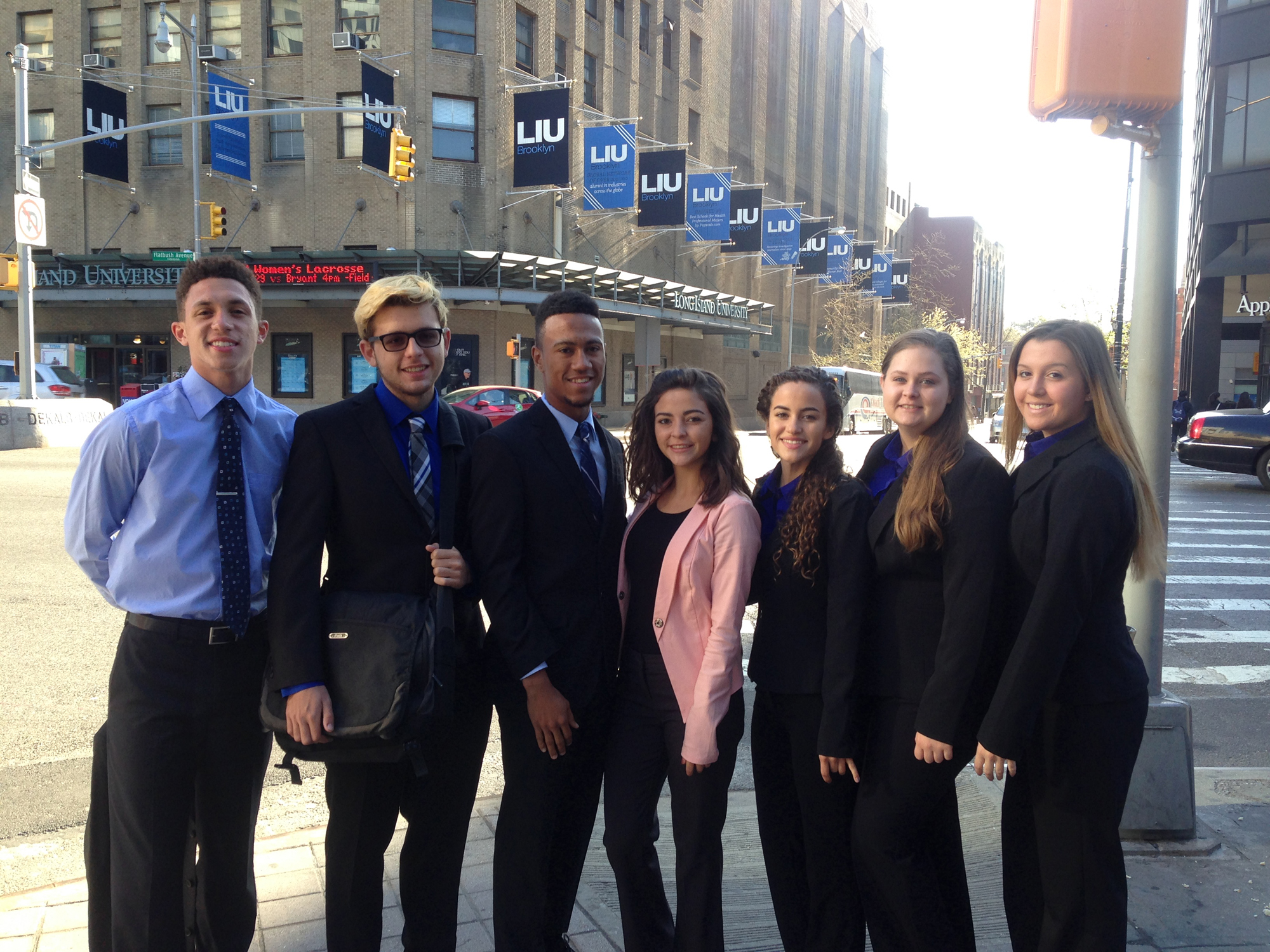 Left to Right: JP Taravella seniors and Virtual Enterprise students Kaylon Schmidt, Michael Hazan, Aaron Mitchell, Josie Lang, Rachelle Serrano, Lauren Echols and Chloe Roque prepare to compete in the 2016 VE Business Plan Competition, hosted at Long Island University in Brooklyn, NY on April 17.
