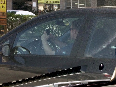 This was taken along Commercial Boulevard of a driver texting while driving.  He was not at a stop light.  