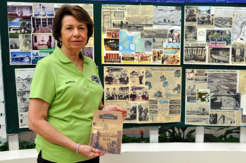 Barbara Tarnove - President of the Tamarac Historical Society holds the new book "Images of America - Tamarac" at Tamarac City Hall