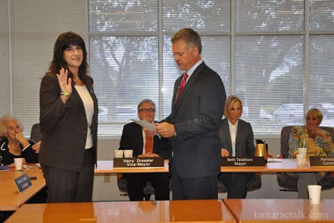 MIchelle Gomez is sworn in by City Manager Michael Cernech