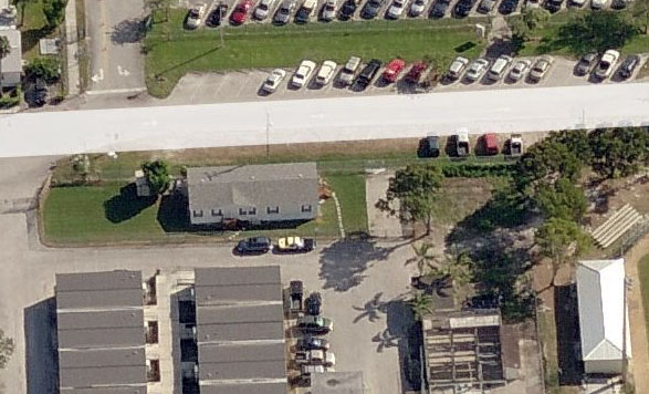 This cozy abode was right outside the baseball fields at this large High School in the Western part of Broward. You can even see the Trooper's car parked outside. 