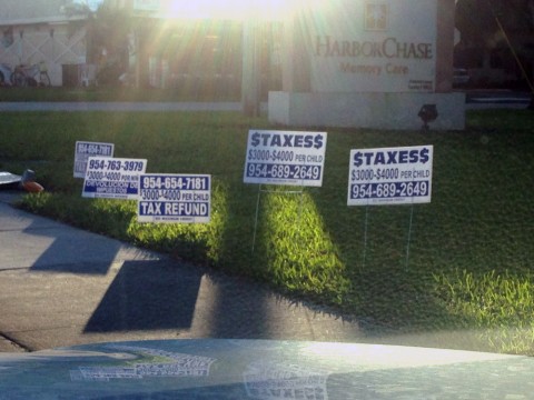These signs were taken in Tamarac this morning. This is typical how our streets and corners look around Tax Time.