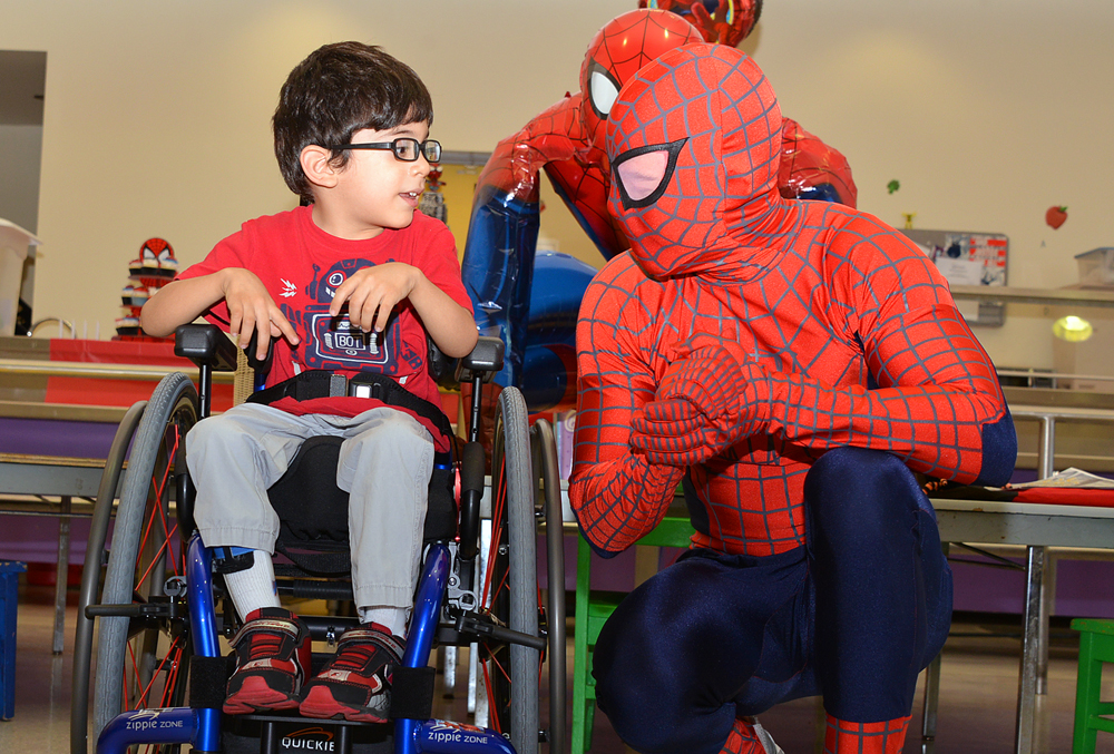 Tamarac Boy with Cerebral Palsy Receives Custom “Spiderman” Wheelchair from Foundation