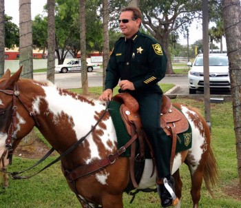 Sheriff Scott Israel riding Hot Chocolate - photo courtesy  Donald Maines