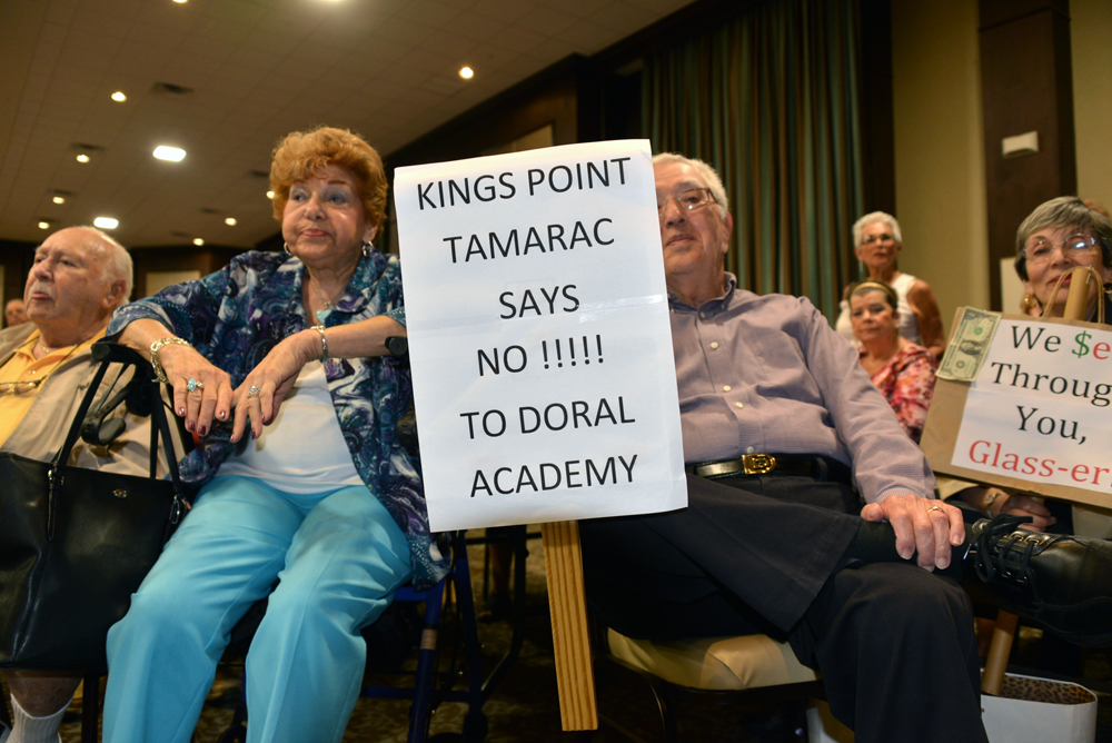 Informational meeting held at Kings Point where residents protested proposed charter school near their community.