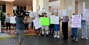 Residents protest in Kings Point during meeting last January.