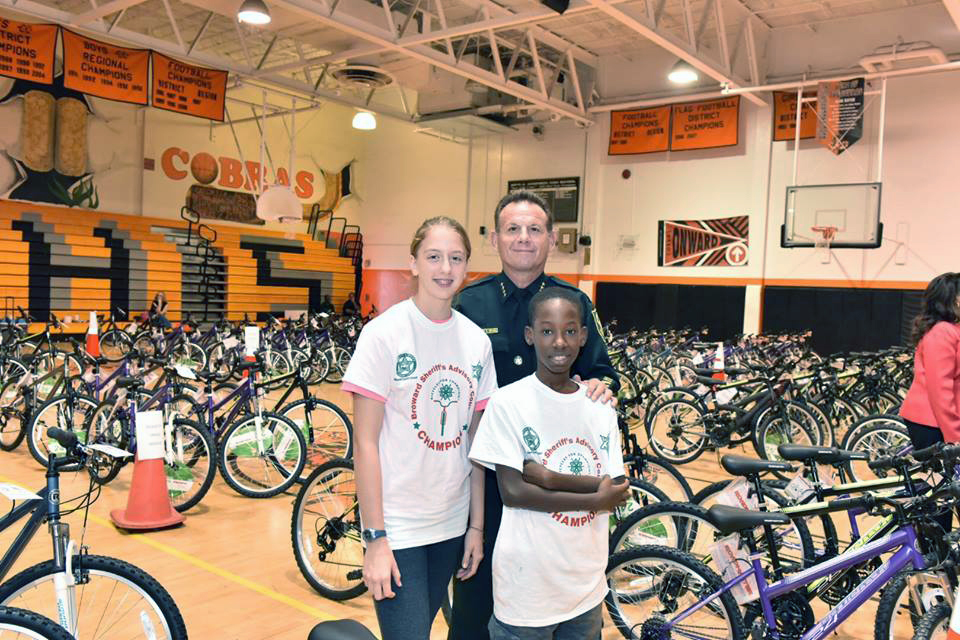 The annual Bicycles for Champions Christmas Extravaganza celebration, also includes a cruise along the Intracoastal Waterway, a lunch buffet, and a visit from Santa, is held to provide holiday cheer, bicycles, and safety equipment to Broward County kids.  Photo by BSO.