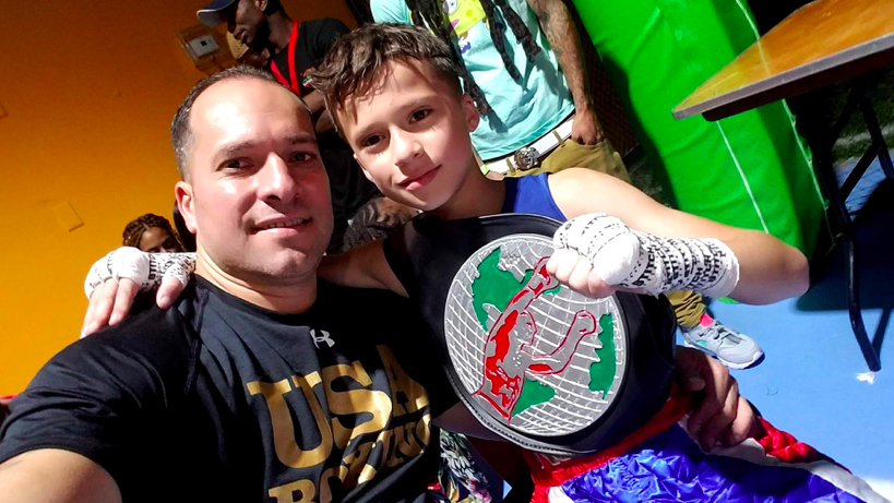 Nine-year-old Youth Olympics Boxing Medalist Trains at his Tamarac Home 1