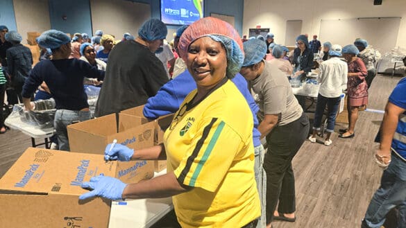 A Community Rises as Hundreds of Volunteers Pack Meals for Jamaica 9