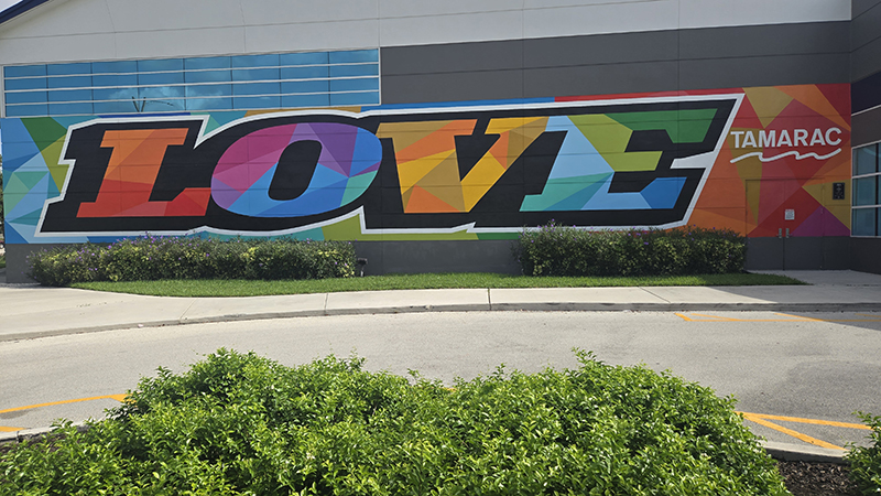 Community Leaders Dedicate Large ‘Love’ Mural in Tamarac 7 Community Leaders Dedicate Large ‘Love’ Mural in Tamarac 5